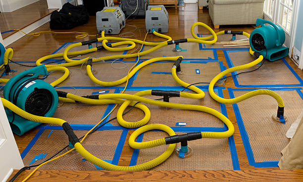 Professional Flood Damage Restoration technician working in Liberty Hill, TX